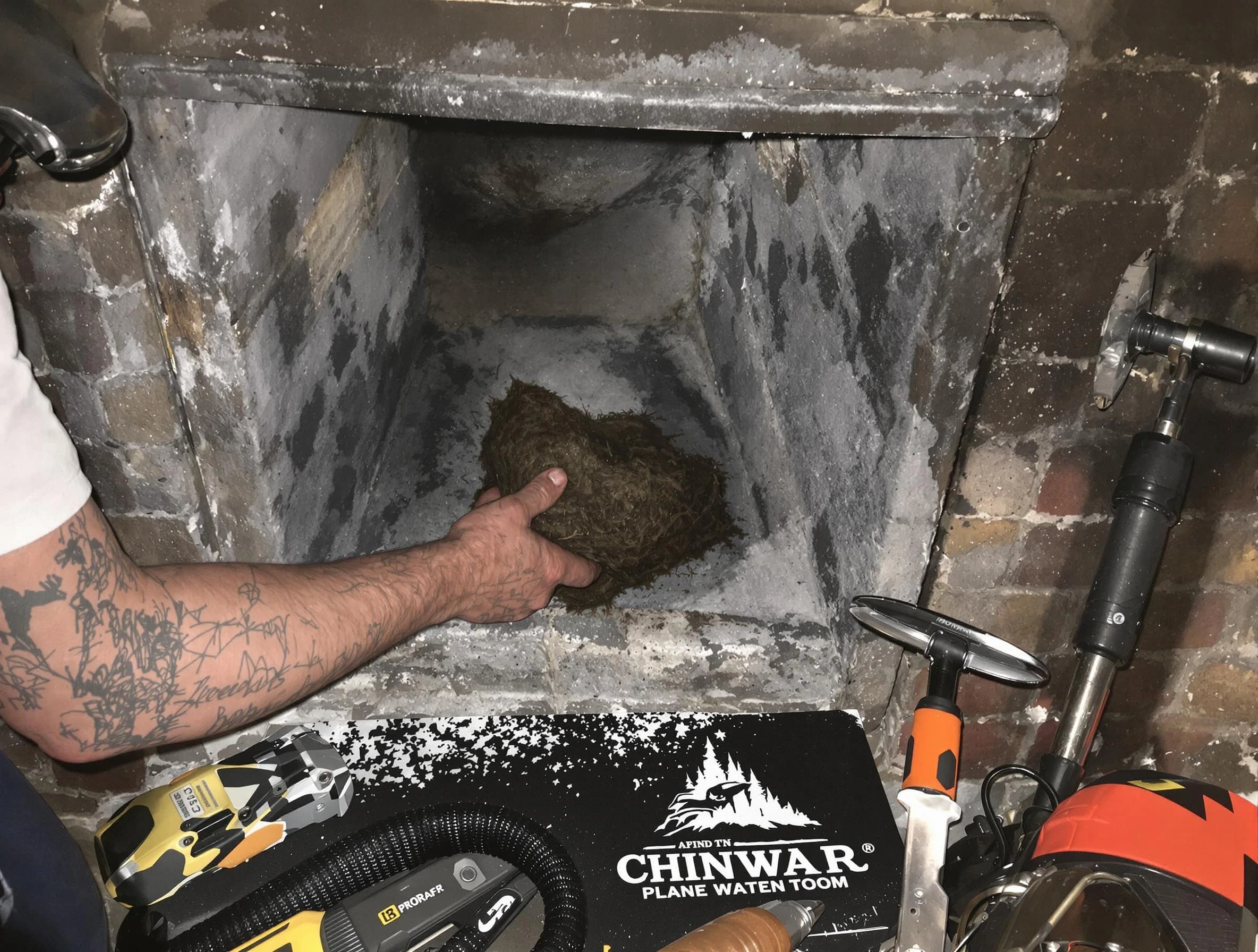 Howell Chimney Sweep safely removing debris and screening chimney in Howell, NJ